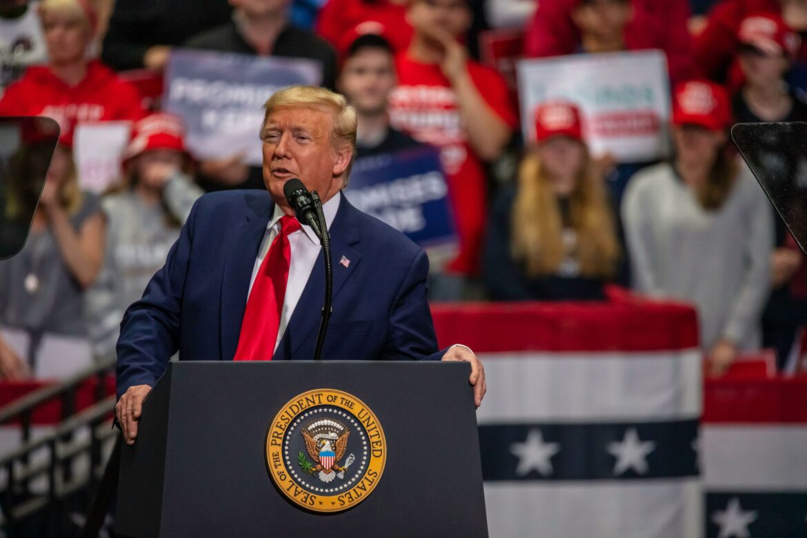2C7HYNT President Trump speaking to his supporters at the rally in the Bojangle's Coliseum